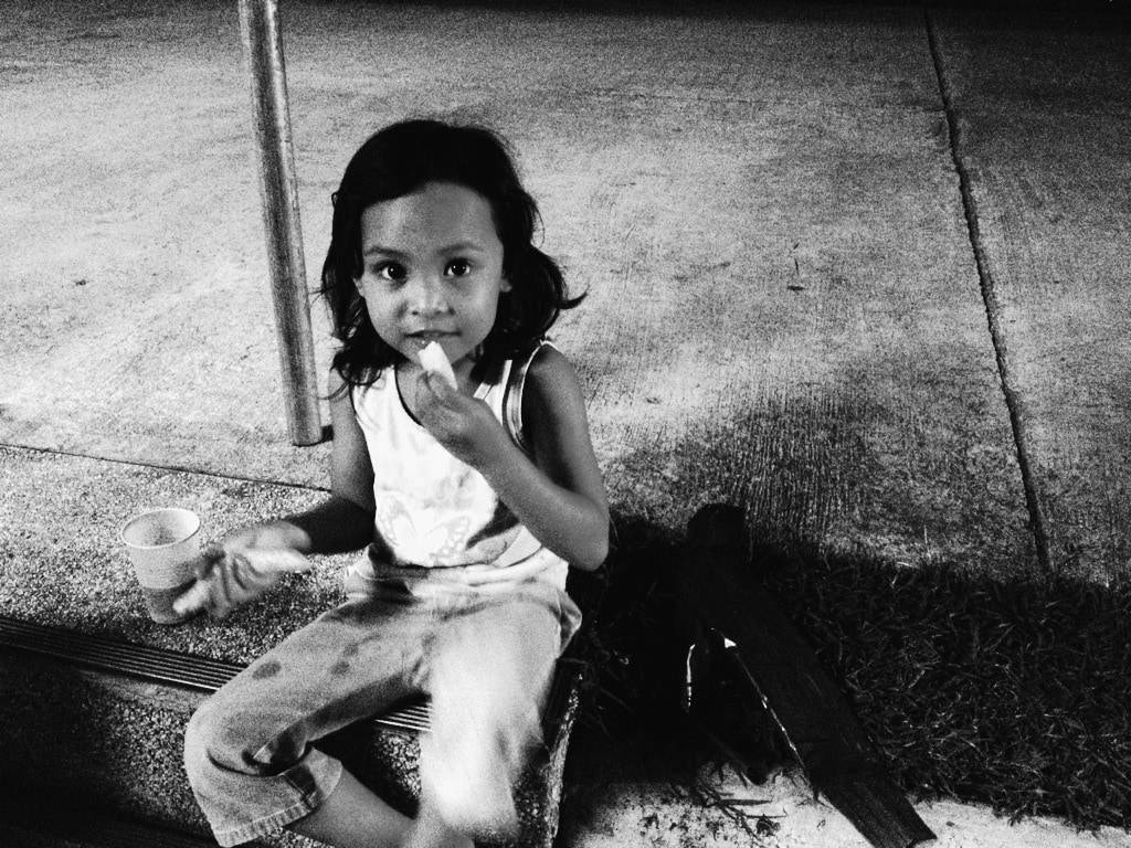 Young girl eating.