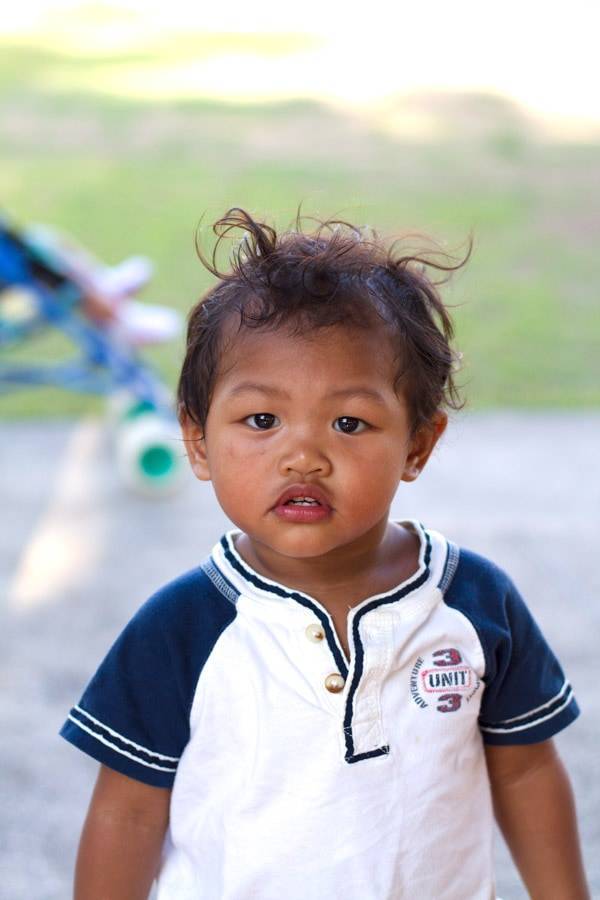 Young boy looking at camera.