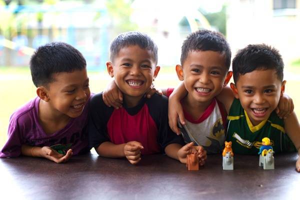 Young boys smiling.