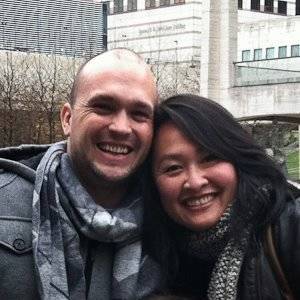 Man and woman smiling.