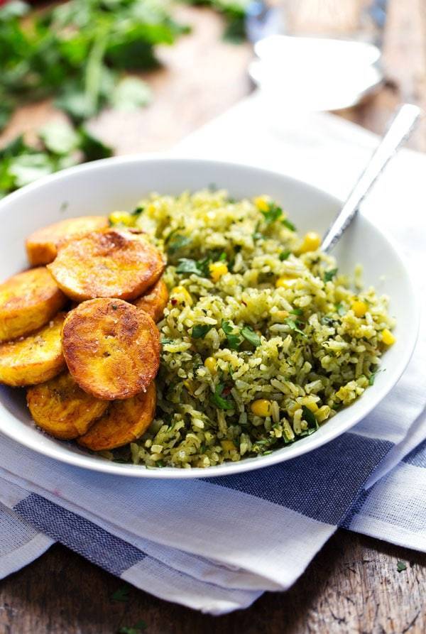 Green Mexican Rice with Corn in a bowl.