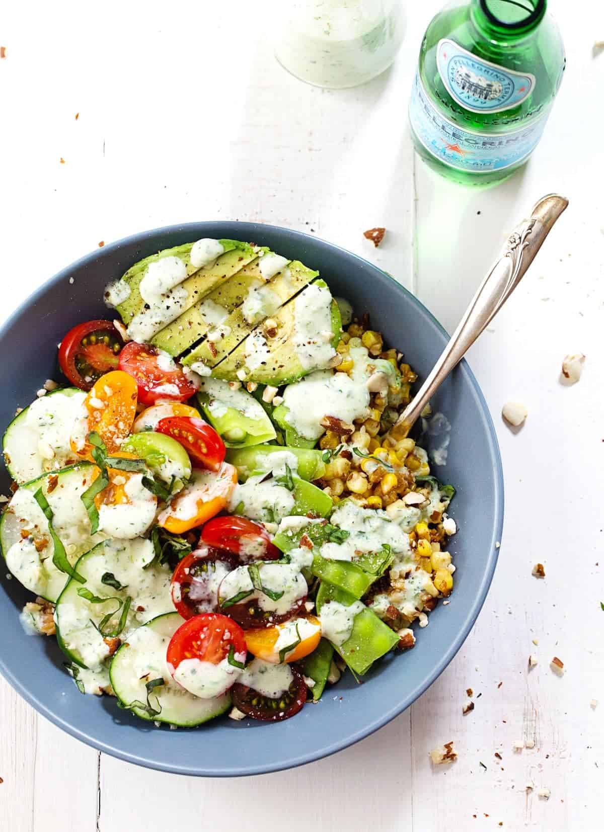 Rainbow Veggie Bowl with Jalapeño Ranch in a blue bowl.