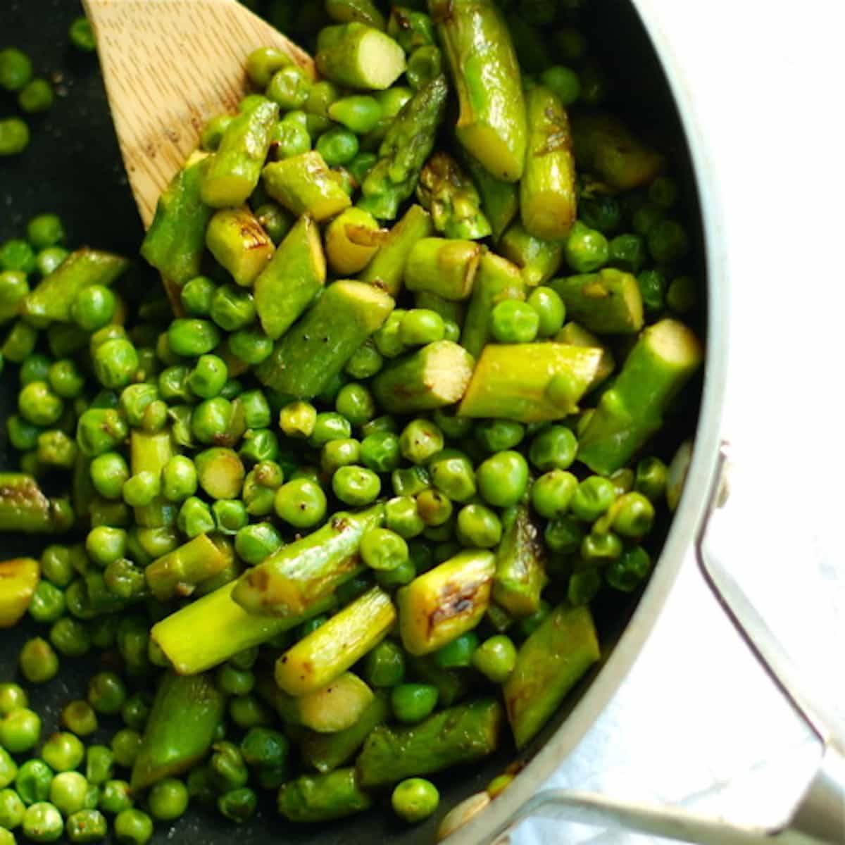 Butter, shallots and honey with asparagus and pea saute.