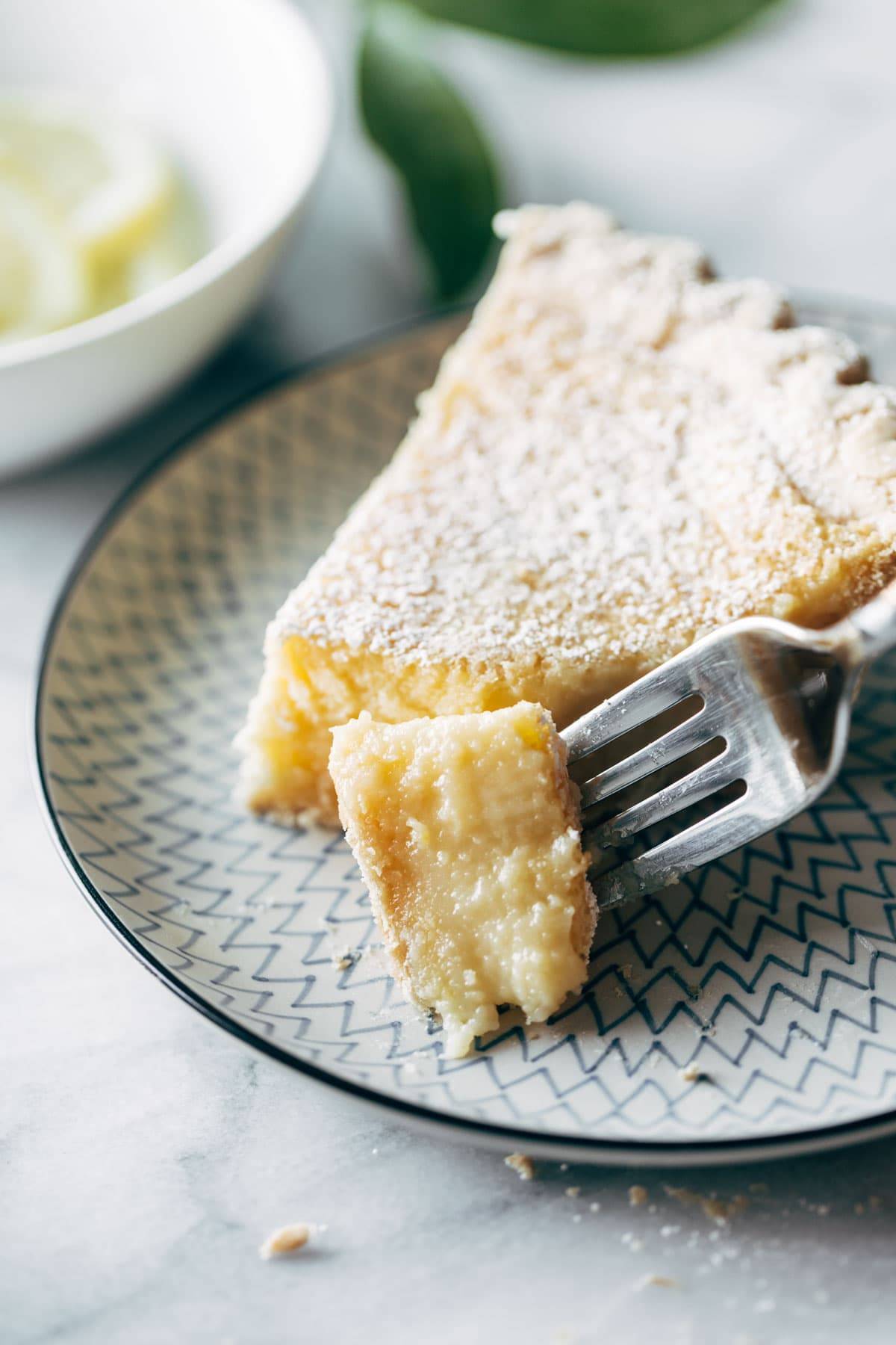 Blender lemon pie with bite taken out.