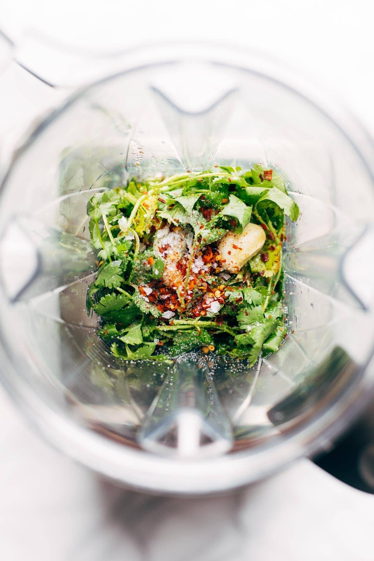 Cilantro Vinaigrette ingredients in a blender.