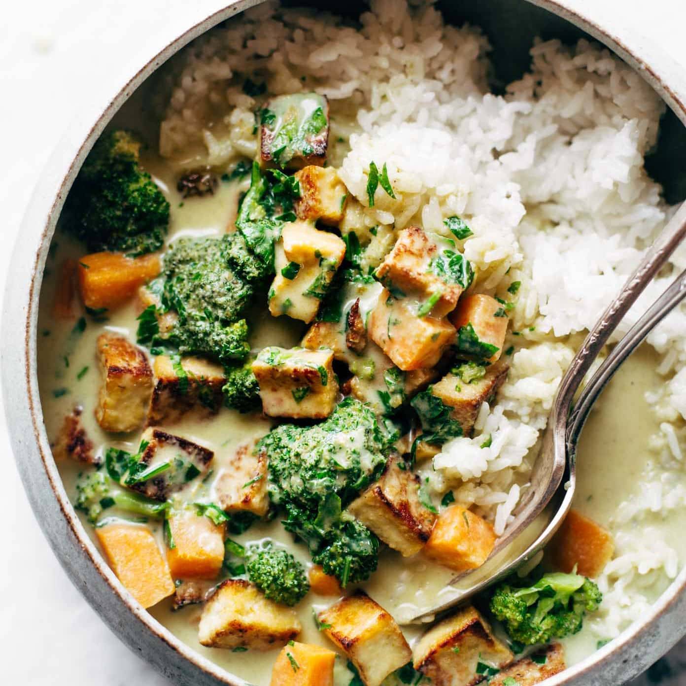 Green Curry in bowl with spoon.