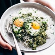 Green Shakshuka on a plate with rice.
