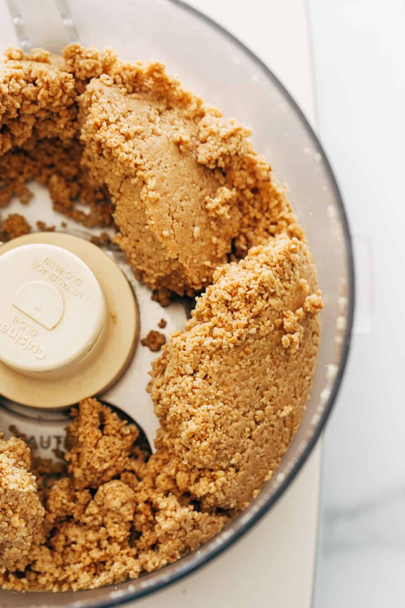 Peanut butter being processed in food processor