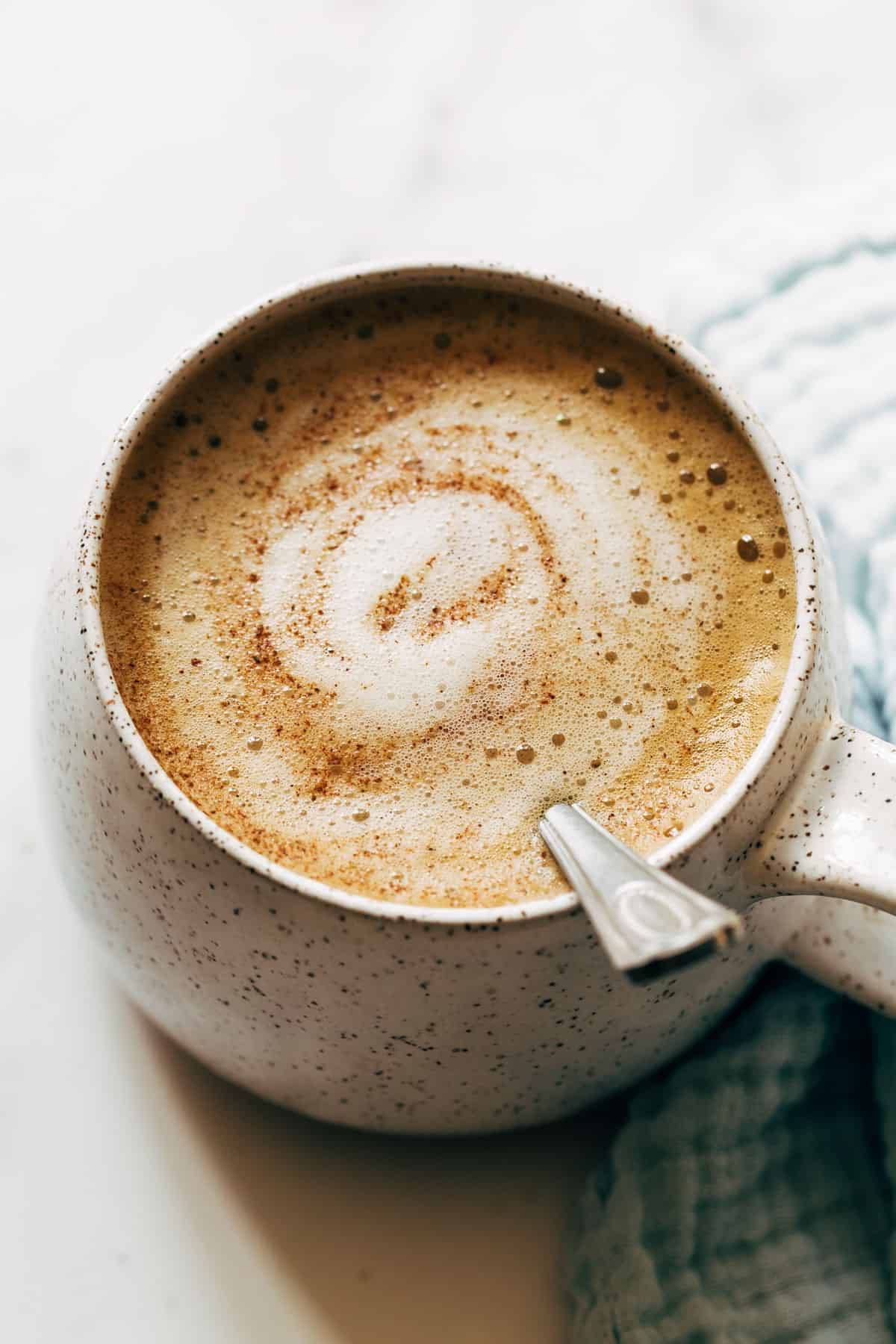 Oatmilk honey latte in a mug.