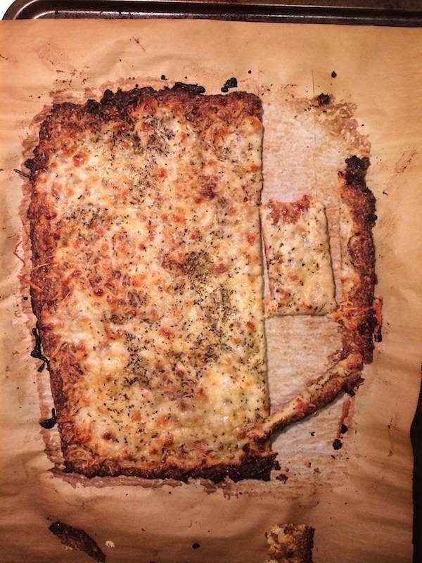 Pizza with burnt crust.