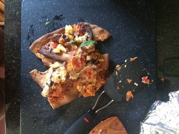 Messy food on a cutting board.