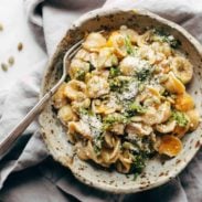 Creamy Parmesan Orecchiette in a bowl with fork.
