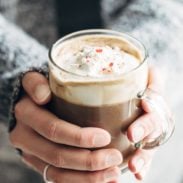 Peppermint Mocha held in hands.