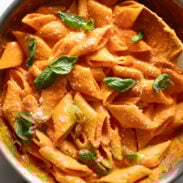Roasted red pepper pasta in a skillet.