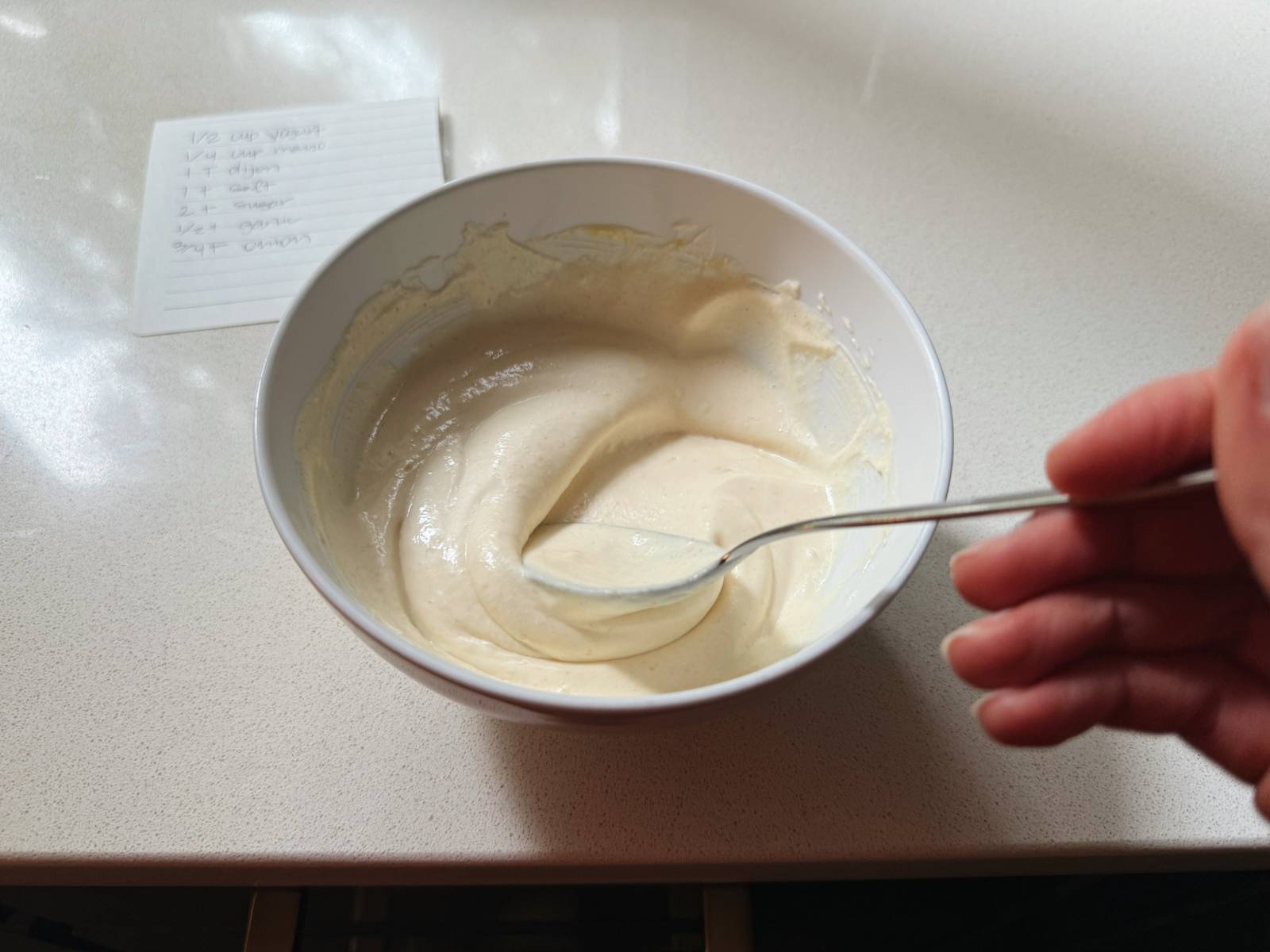 Mixing up dressing for chicken salad.
