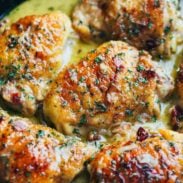 Skillet Chicken with Bacon and White Wine Sauce in a pan.