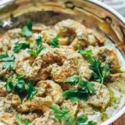 Spanish Shrimp with Garlic Bread Sauce in a pan with parsley.