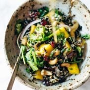 Thanksgiving Salad in a bowl with dressing.