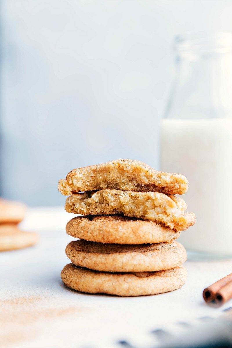 Stacked cookies with half bitten cookies.