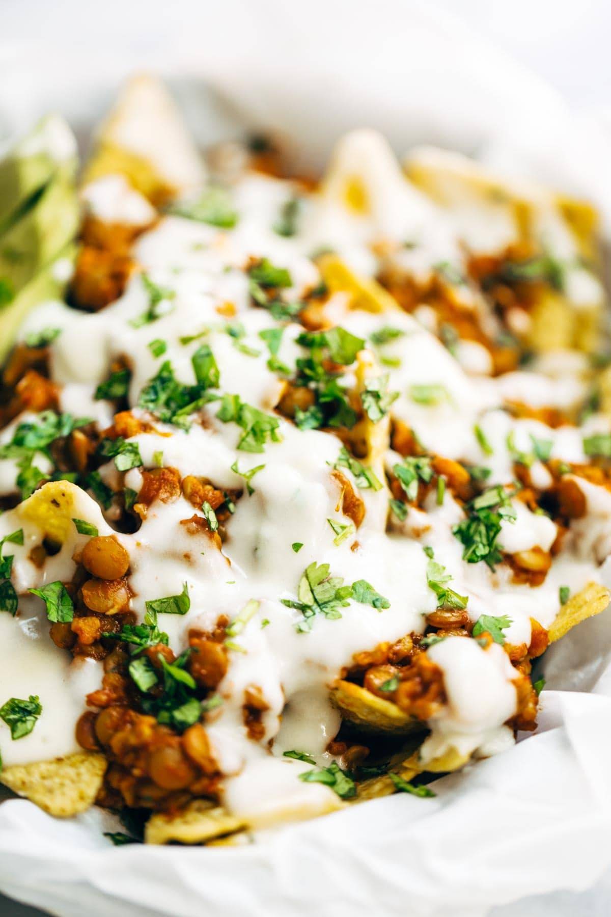 Spicy Lentil Nachos with Three Cheese Sauce - you will not believe how good these are! Saucy filling with a velvety homemade cheese sauce. Vegetarian. | pinchofyum.com Spicy Lentil Nachos with Three Cheese Sauce - you will not believe how good these are! Saucy filling with a velvety homemade cheese sauce. Vegetarian. | pinchofyum.com