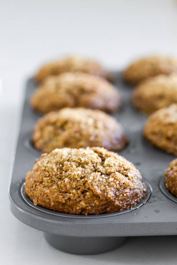 Gingerbread muffins in a muffin tin.