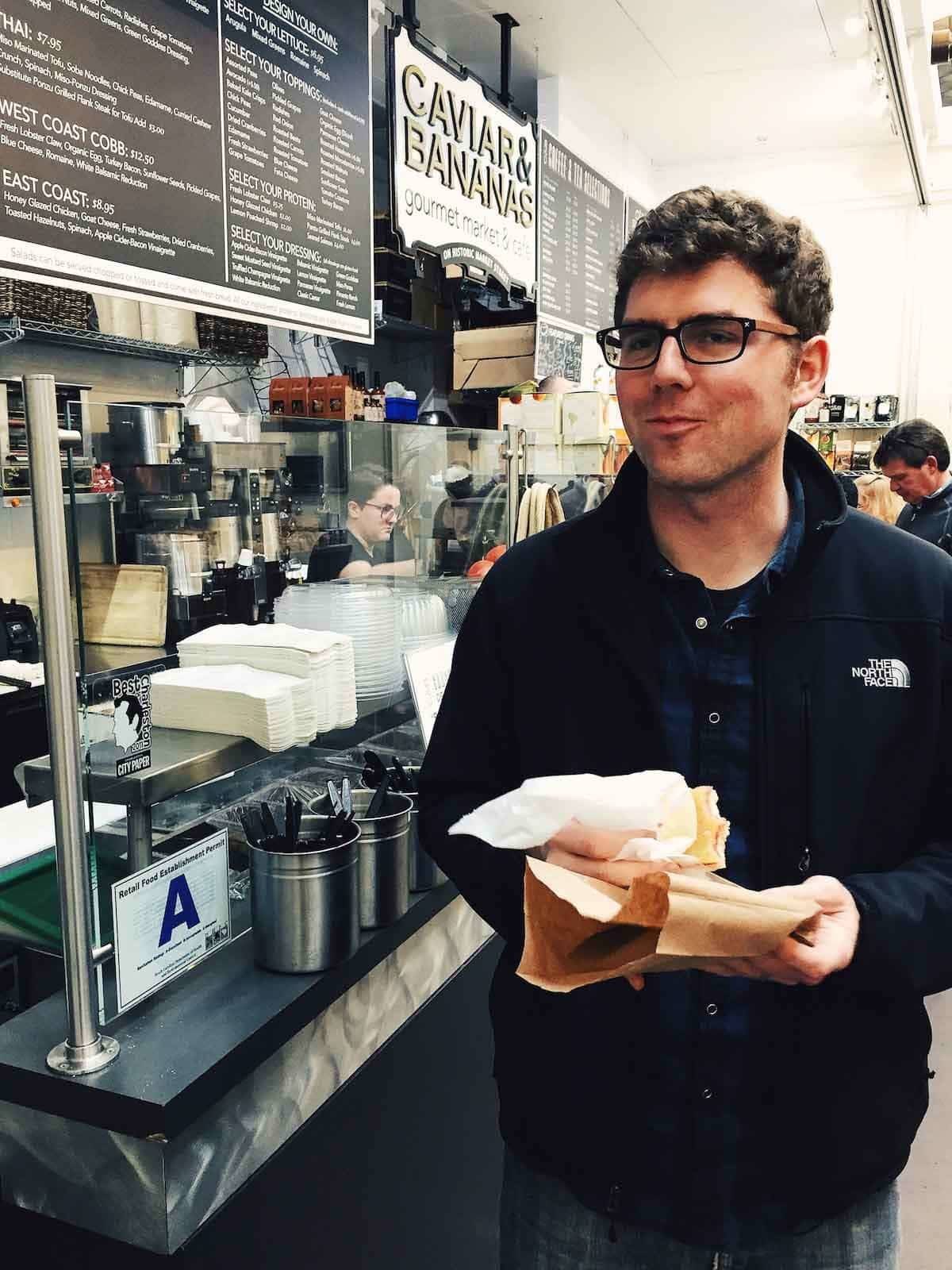 Man holding food.